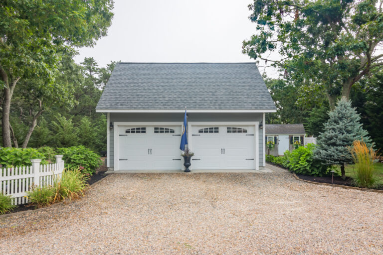 A standard salt box two car garage in North Truro, MA.